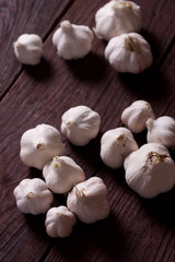 Garlic bulbs on wooden table