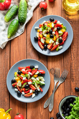 Greek salad with fresh tomatoes, peppers and cucumbers