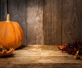 autumn pumpkins and other on a wooden table