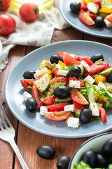 Greek salad with fresh tomatoes, peppers and cucumbers