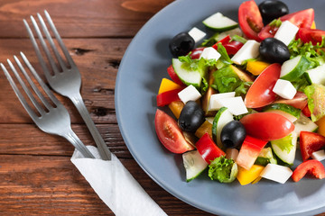 Greek salad with fresh tomatoes, peppers and cucumbers