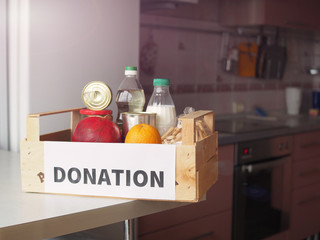 Food box in the kitchen. The concept of donation.
