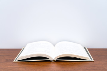 A book open on white background