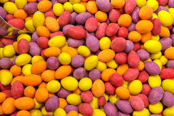 Multicolored candies for sale in a candy shop
