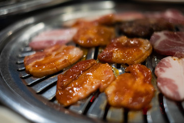 Pork grill on hot coals, Korean or Japanese BBQ Yakiniku style.