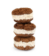 Sweet delicious ice cream cookie sandwiches on white background