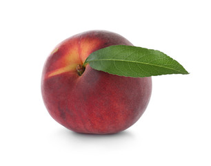 Delicious ripe peach with leaf isolated on white