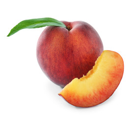 Fototapeta na wymiar Sweet juicy peaches with leaf on white background