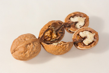 walnuts in a basket isolated on white