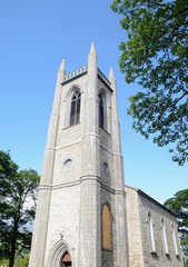 Fototapeta na wymiar St. Columba’s church e village of Drumcliff, near Sligo, Ireland. Famous Irish writer and poet Yeats is buried in the church yard.