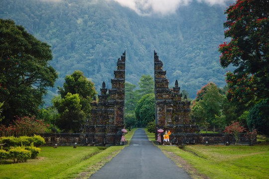 Landscape with mountains and tradition Balinese gate in Bali