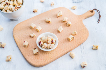Inner Mongolia specialty dried cheese on cutting board in China
