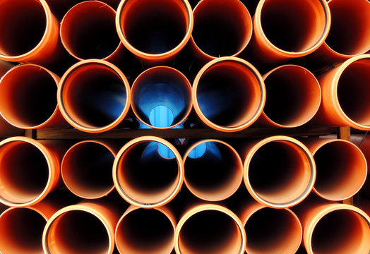 Plastic Water Pipes Stacked Close Up 