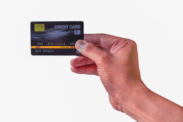 Man's Hand holding black plastic credit card isolated on white background.