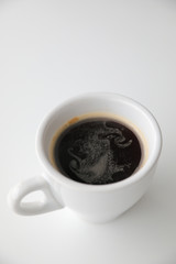 hot coffee espresso in white tone room