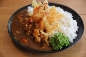 Japanese curry rice with fried shrimp tempura Japanese food