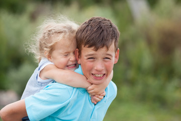 Group of happy cheerful beautiful children in park, outdoor,