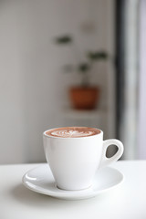 hot chocolate in white tone room