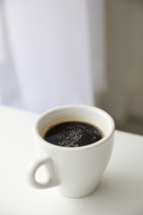 hot coffee espresso in white tone room