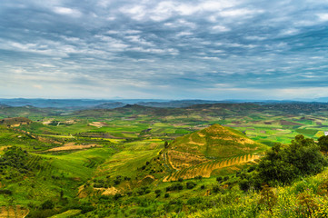 Fototapeta na wymiar Green Sicilian Valley with a Wonderful Cloudscape, Mazzarino, Caltanissetta, Sicily, Italy, Europe