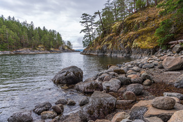 View over Inlet, ocean and island with mountains in beautiful British Columbia. Canada.