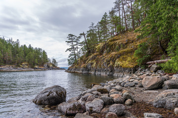 View over Inlet, ocean and island with mountains in beautiful British Columbia. Canada.