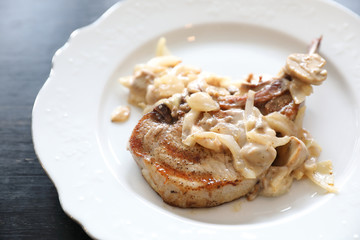Pork chop with mushroom sauce