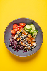 eel with fresh vegetables on the yellow backgound