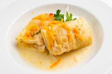 lahanodolmathes with broth based sauce and dill