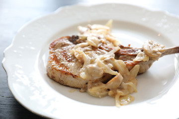 Pork chop with mushroom sauce