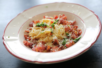 Spaghetti white sauce (Spaghetti Carbonara) with bacon and garlic , on wood table background