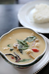 Coconut milk soup with chicken and rice , traditional Thai food