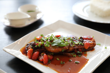 Fried fish with spicy sauce and rice , traditional thai food