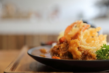 Japanese curry rice with fried shrimp tempura Japanese food