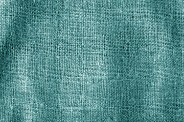 Sack cloth texture with blur effect in cyan color.