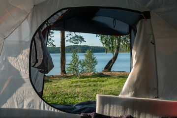 rest in a tourist tent on the shore of a picturesque lake