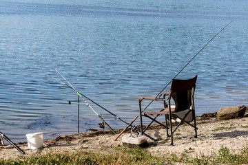 Fototapeta na wymiar fishing rods are on the beach