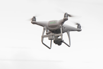 The flight of the quadcopter in the sky