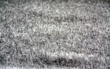 Grey color sack cloth texture with blur effect.