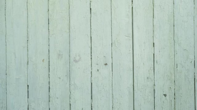 Man's hand holds out reusable recycled mesh produce bag with pomegranates, and woman's hand takes it. Zero waste shopping concept. No single use plastic.