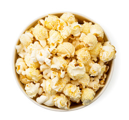 Full bucket of popcorn on a white, isolated. The view of the top.