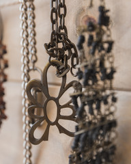 Close-up of metallic bracelet and chain