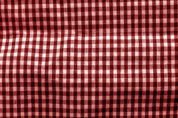 Checked fabric texture in red tone.
