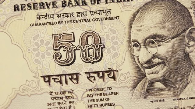 Indian valuable rupee currency notes of 100, 50, and 10 denominations, close up