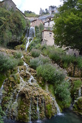 Waterfalls With Silk Effect Of A Crystalline Greenish Water In Orbaneja Del Castillo. August 28, 2013. Orbaneja Del Castillo, Burgos, Castilla Leon, Spain. Vacation Nature