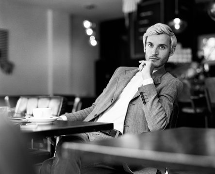 Stylish Young Man in Cafe