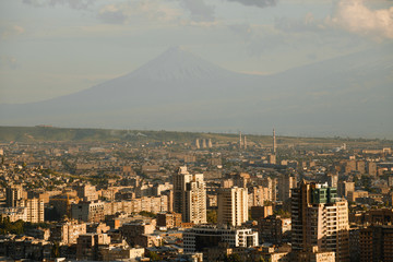 Yerevan City view with majestic Ararat mountain in the background. Sunrise in Erevan - the capital of Armenia. Travel to Armenia, Caucasus.