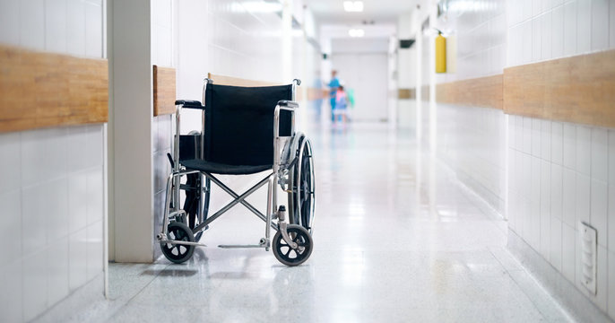 Concept photo of wheelchair in a hospital corridor