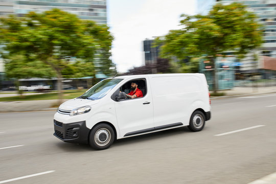 Man driving a car.