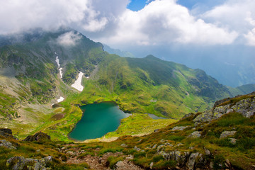 Landscape from Capra Lake in Romania and Fagaras mountains in the summer